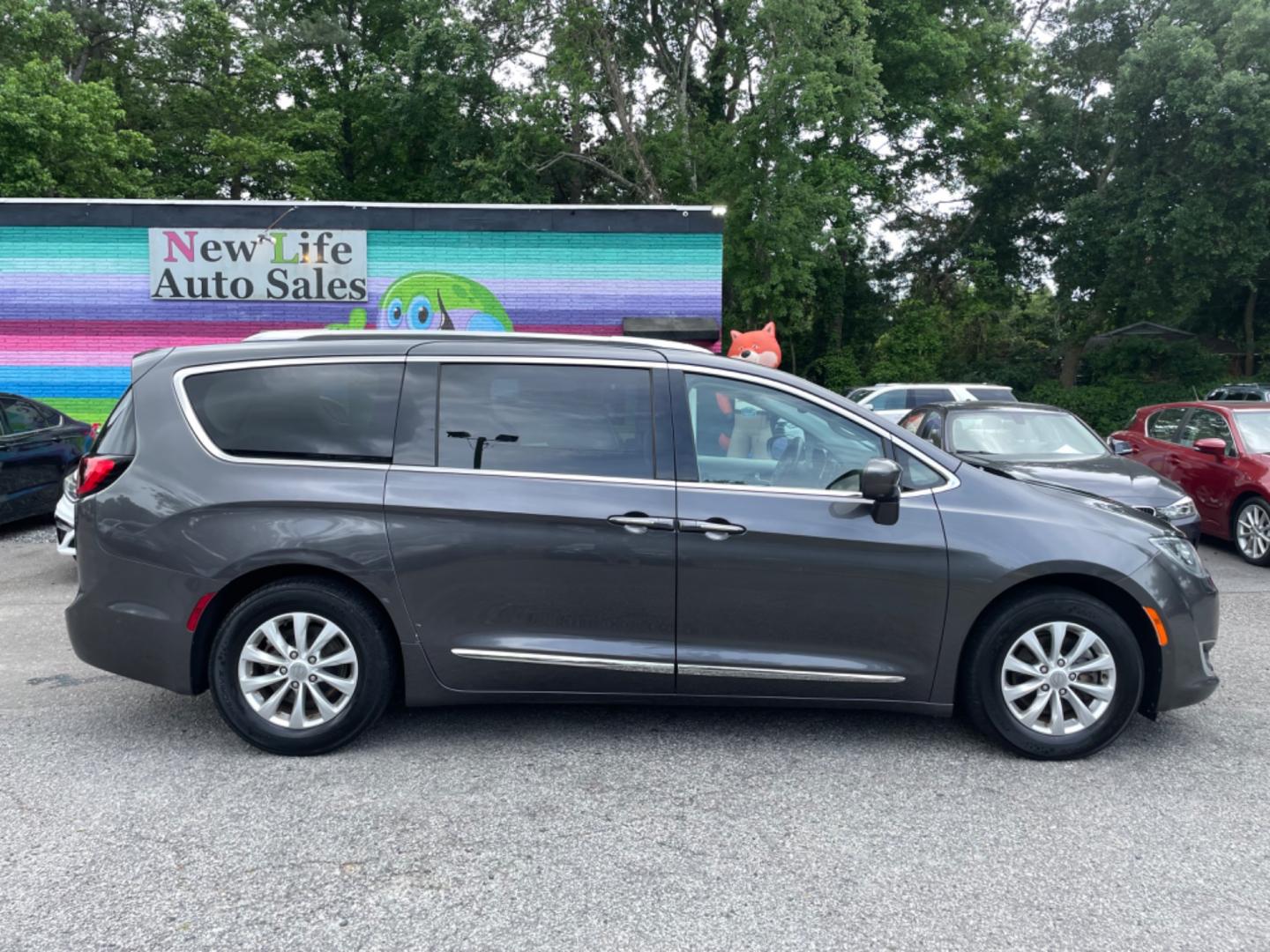 2018 GRAY CHRYSLER PACIFICA TOURING L (2C4RC1BG5JR) with an 3.6L engine, Automatic transmission, located at 5103 Dorchester Rd., Charleston, SC, 29418-5607, (843) 767-1122, 36.245171, -115.228050 - Local Trade-in with Leather, Touchscreen with Phone Connect, AM/FM/AUX/Bluetooth, Backup Camera with Top 180 View, Parking Sensors, Lane Departure Sensors, Dual Climate Control, Power Everything (windows, locks, mirrors, seats), Power Sliding Doors, Power Liftgate, Stow 'n Go Middle Row, Full Size T - Photo#7